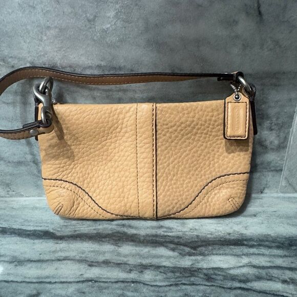 Coach Handbags - Coach Pebbled Tan Leather Corner Zip Wristlet